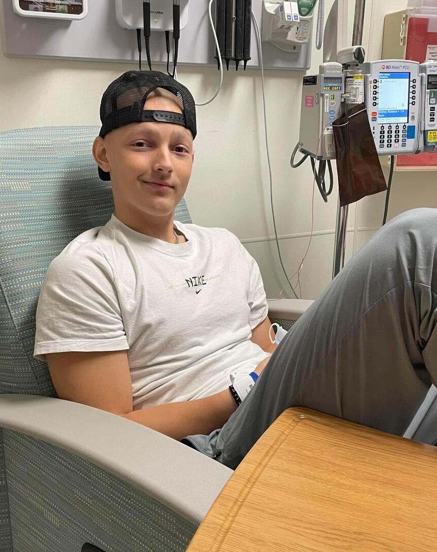Brycen Doughty smiles while in hospital after receiving cancer diagnosis